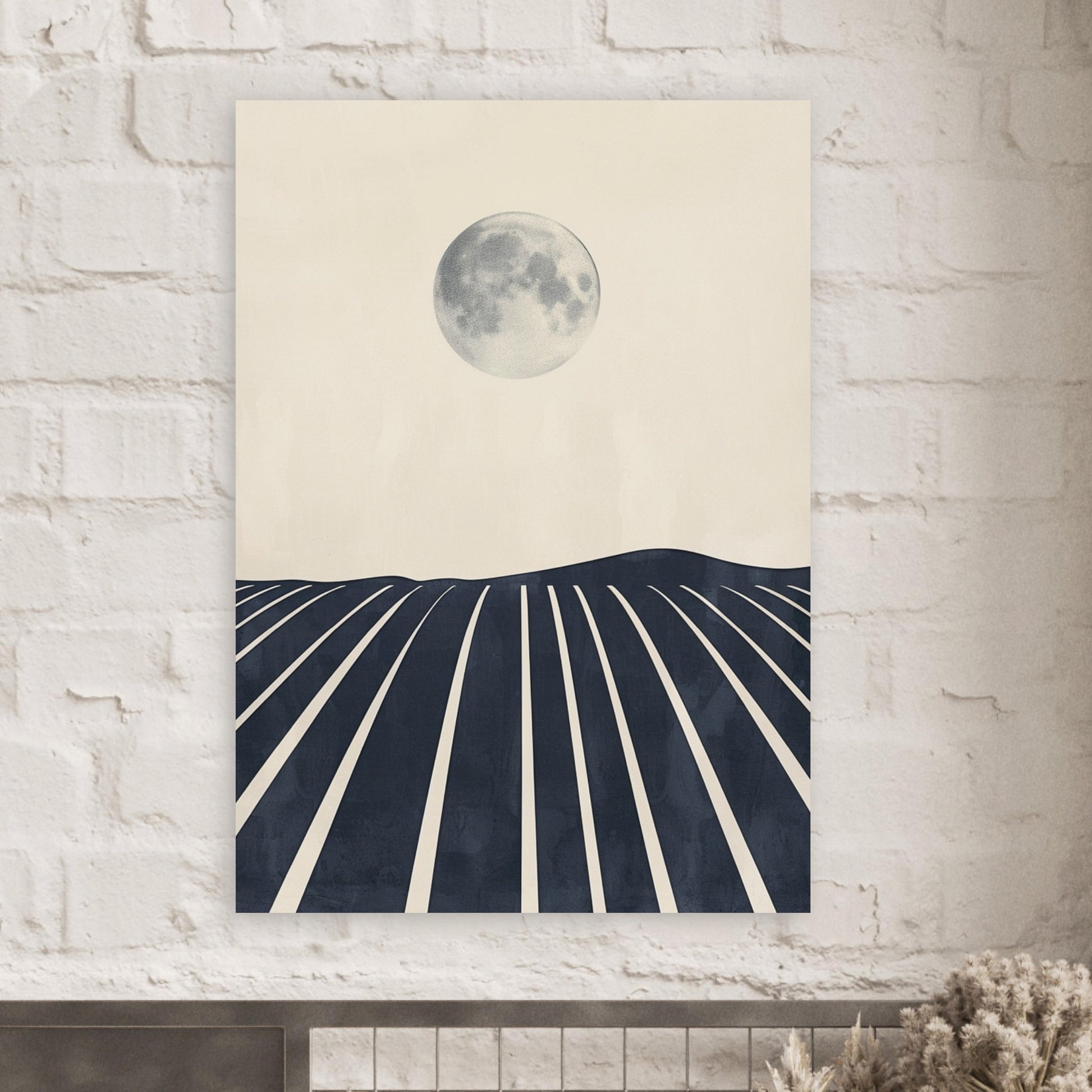 A Midnight Vineyard artwork hanging in a minimal, modern room with natural textures and subtle lighting. The black-and-white vineyard lines and moonlit sky provide a sleek, architectural aesthetic that enhances the space with quiet sophistication and a serene visual presence.