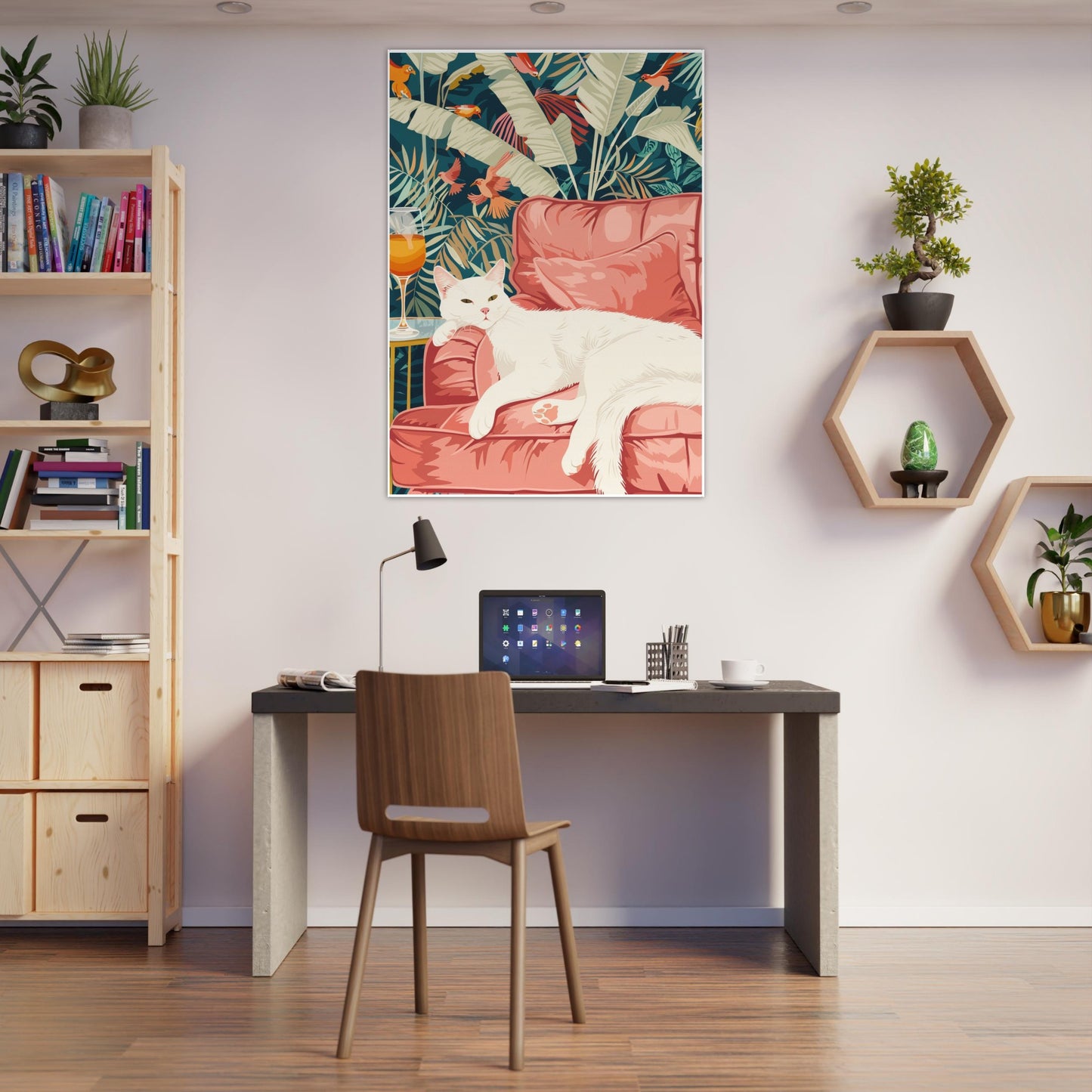 Framed Tropical Lounge White Cat Art Print displayed above a modern desk setup with light wood tones and minimal decor. The mockup demonstrates how the print enhances a home office space with its warm colours and tropical style, adding personality and a calm atmosphere to a simple, contemporary workspace.